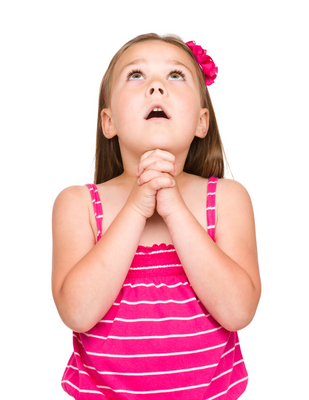 Cute little girl is praying